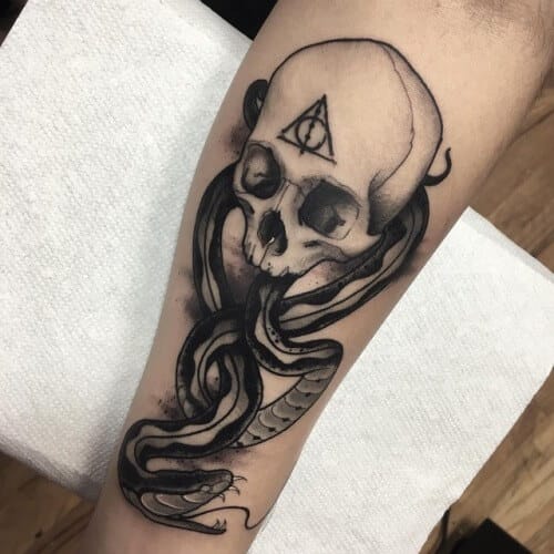 15 Traditional Skull And Snake Tattoos - PetPress