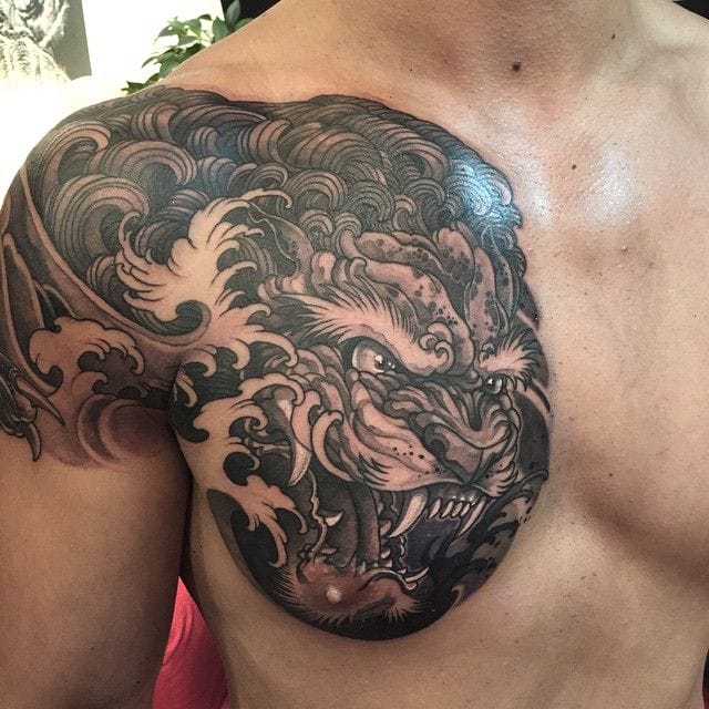 Foo dog and tigers tattoo